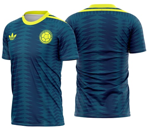 Foto da camiseta unissex branca com logo no peito e estampa grande nas costas, inspirada no uniforme reserva da Colômbia para 2026, estilo esportivo e moderno.