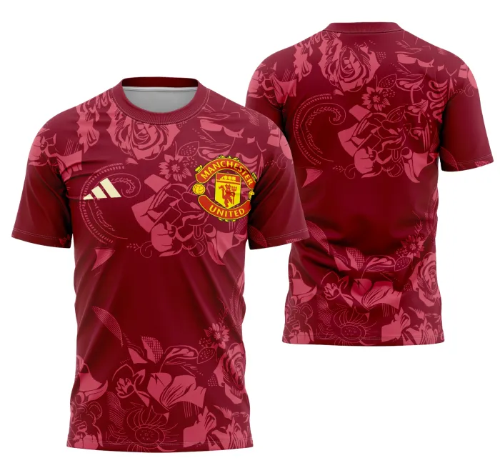 Camiseta unissex preta com logo do Manchester United no peito e estampa grande nas costas com floral fantasia do time, design moderno e vibrante para fãs do clube.